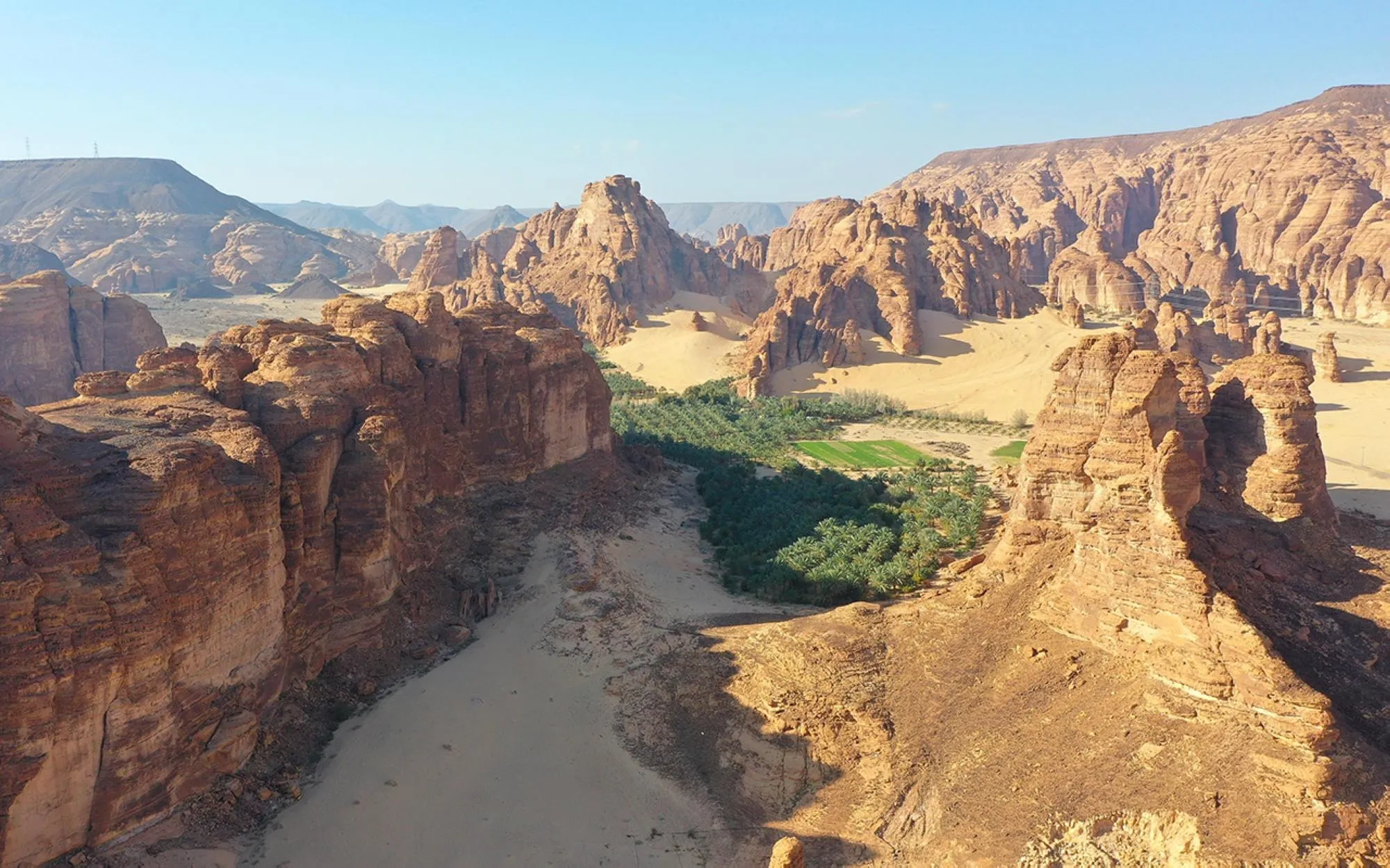 Aerial view of AlUla oasis rock formations