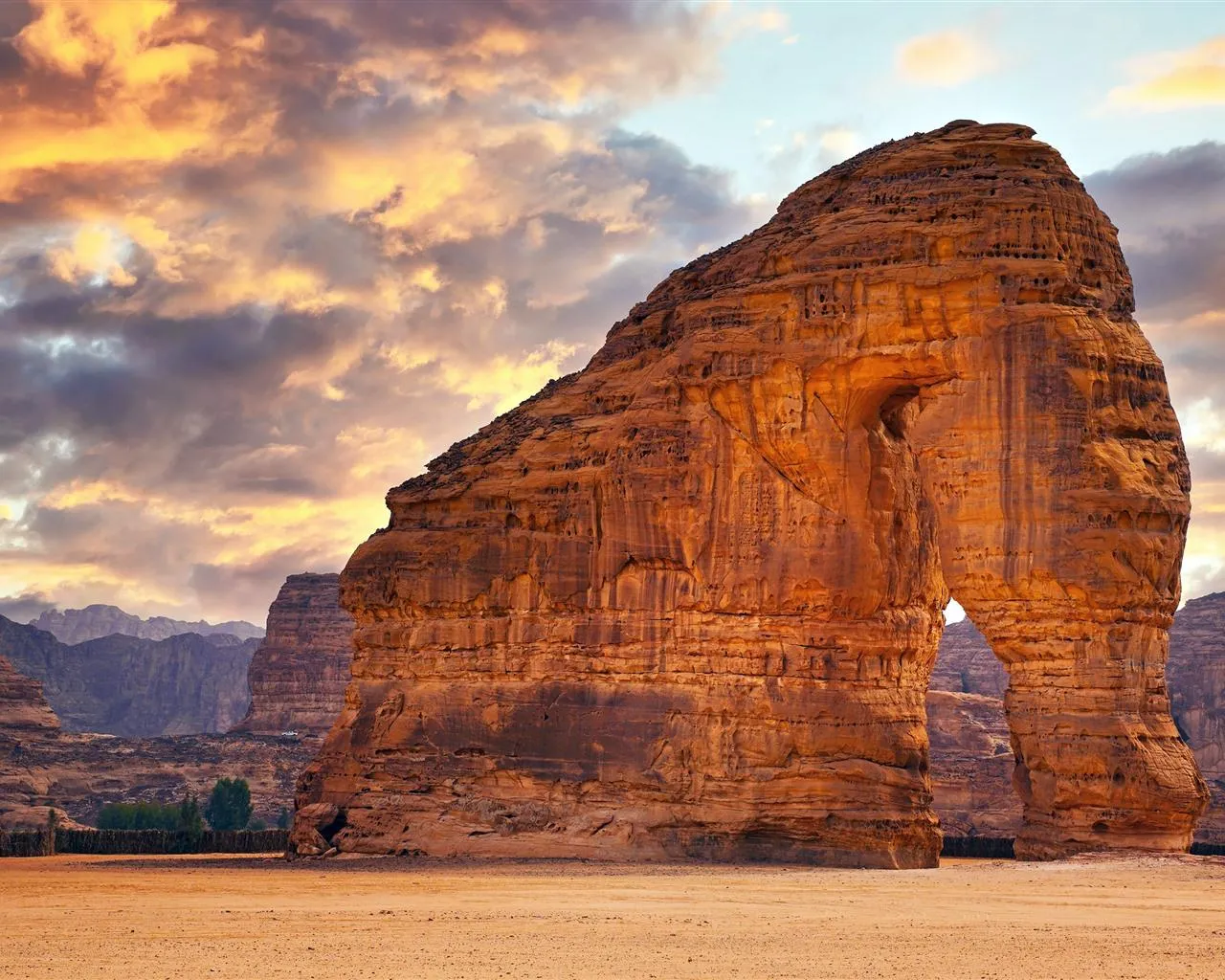 Dramatic Elephant Rock formation AlUla at sunset