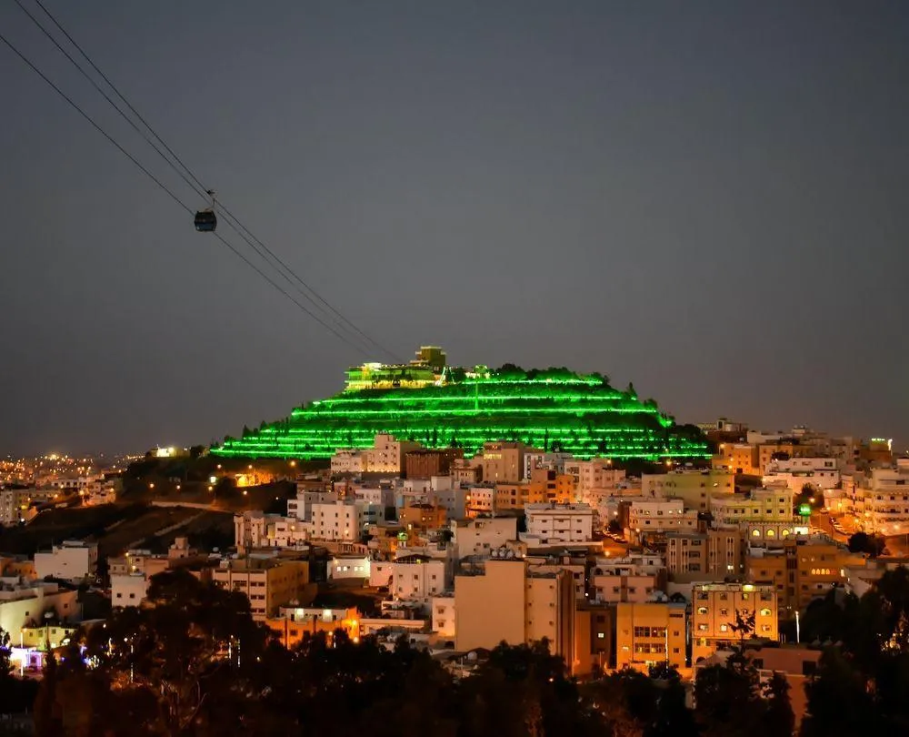 Green Mountain Abha cable car illuminated at night