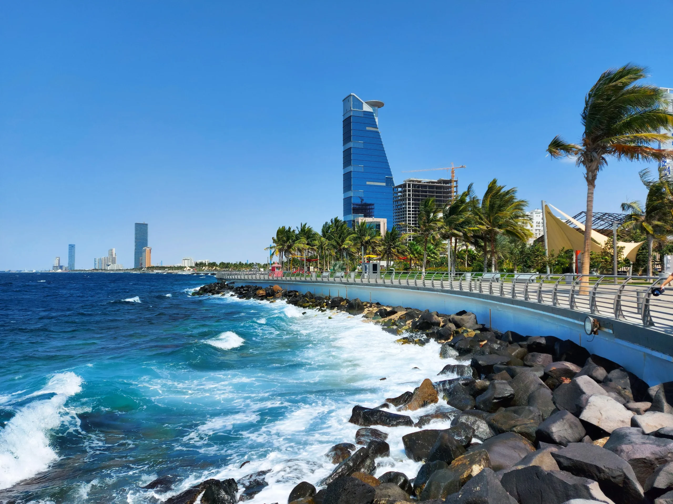 Jeddah Corniche promenade walkway facing turquoise waves