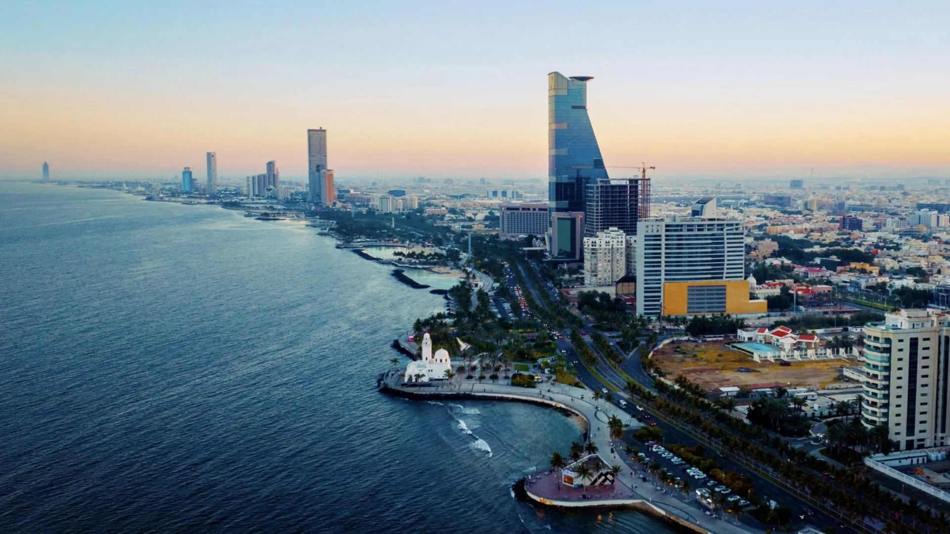 Aerial sunset view of Jeddah coastal skyline