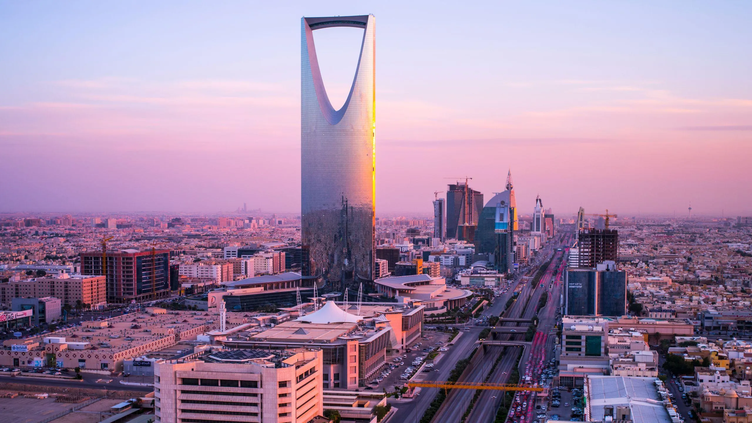 Pink sunset over Kingdom Centre Riyadh skyline