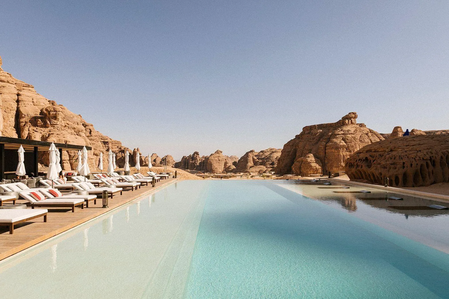 Luxury pool resort in AlUla desert mountains